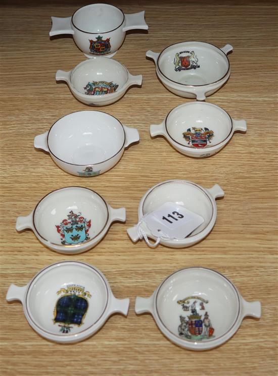 Two Goss crested ware quaiches and seven others (9)